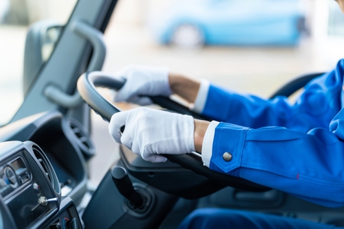 Large,Vehicle,Driver,Holding,Steering,Wheel.,Traffic,Occupation.